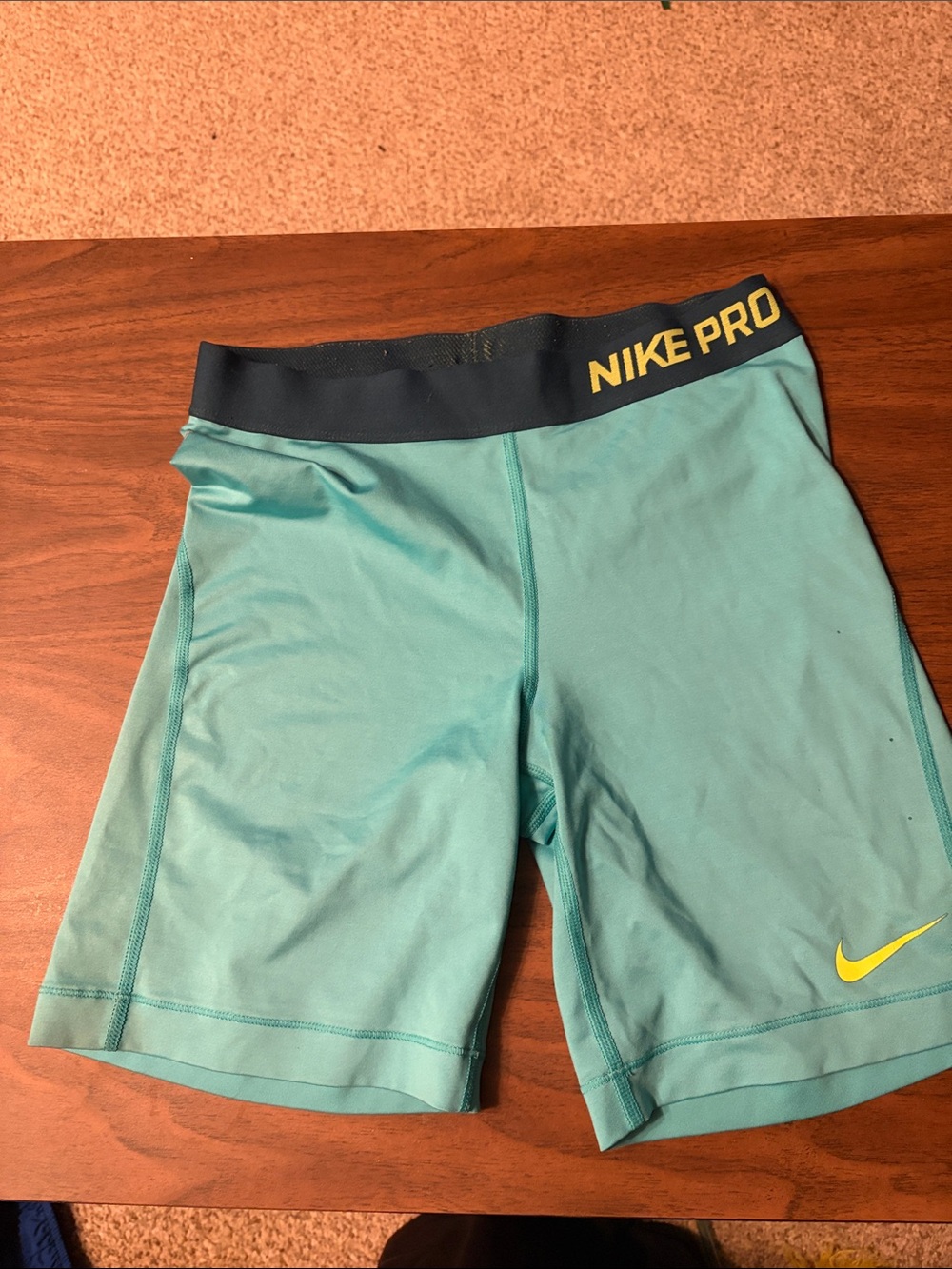 Nike Pro Teal Athletic Shorts with Yellow Swoosh